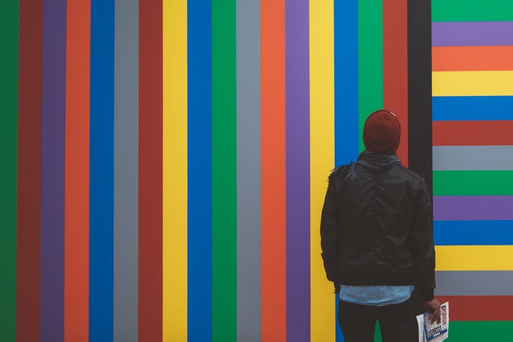 man staring at colors